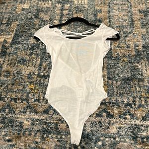 Free people tie back bodysuit never worn size XS